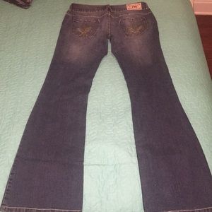 Jeans with Fleur De Lis on pockets